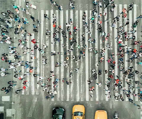 Crowd of people at crosswalk