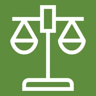 Scales balance evenly, symbolizing justice or fairness against a solid green background.